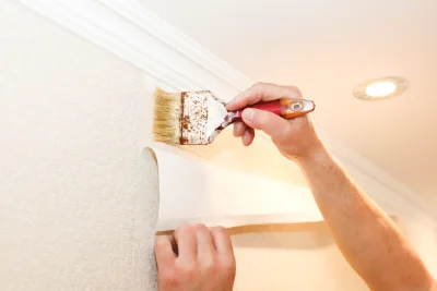 Pose de papier peint à la Ferrière-au-Doyen — revêtements muraux et toiles de verre